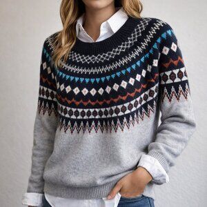 Cozy oversized Fair Isle inspired sweater, tagged as XL, suitable for M or L